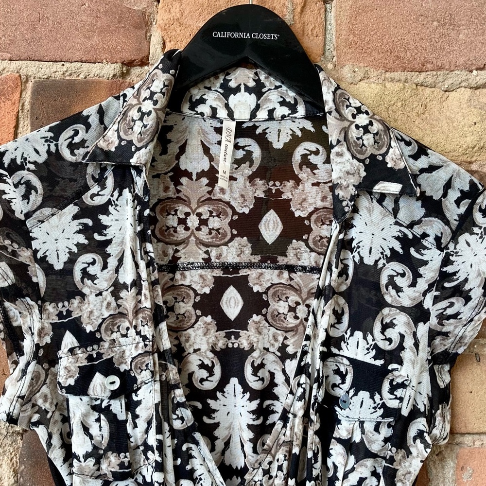 Black, Brown & White Short Sleeve Deep V-Neck Wrap Shirt. Size: Medium.